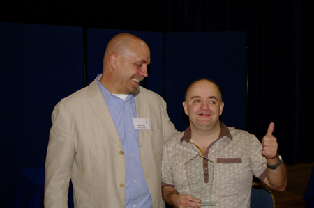 Billy Zima and Identity service user, Alan collecting the Award
